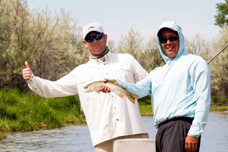 guys holding a fish