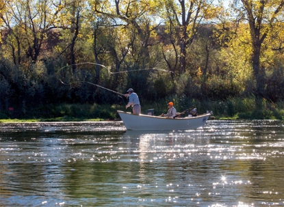 Men fishing off boat