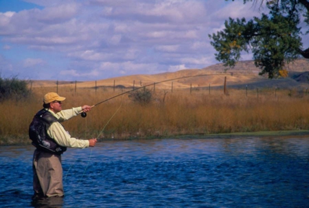 man fishing in water